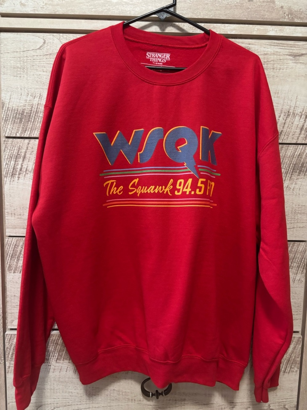 NWOT - Stranger Things
Men’s WSQK 'The Squawk 94.5' Graphic Sweatshirt